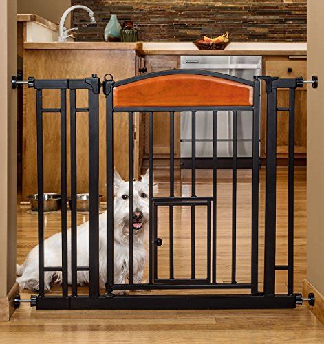 A baby gate with cat door or kid's safety gate mainly made of metal, plastic and wood. The Best Baby Gate with Pet Door | 2017 Star Product Review