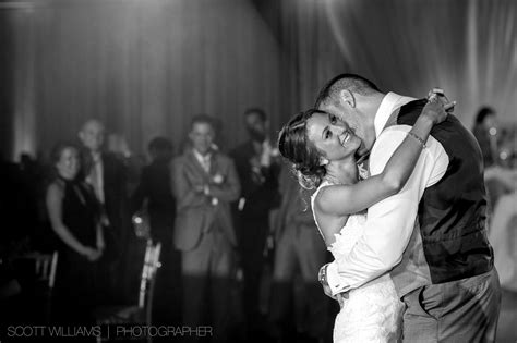 A Bride And Groom Sharing Their First Dance