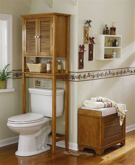 One with open shelves and hanging racks is small enough to squeeze into a sliver of wall space above your toilet. Over toilet storage | Small bathroom storage, Bathroom ...