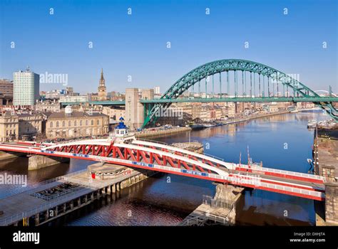Newcastle Upon Tyne City Skyline With Tyne Bridge And Swing Bridge Over