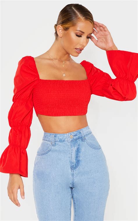 Red Ruched Long Sleeve Crop Top Tops Prettylittlething