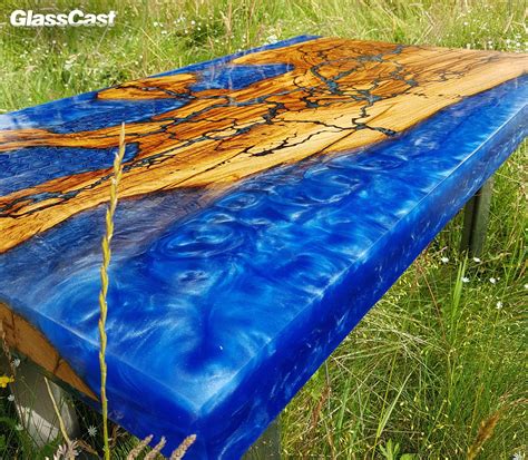 Unique river live edge custom coffee table made from olive wood and epoxy resin. Honeycomb Epoxy Resin River Coffee Table - GlassCast