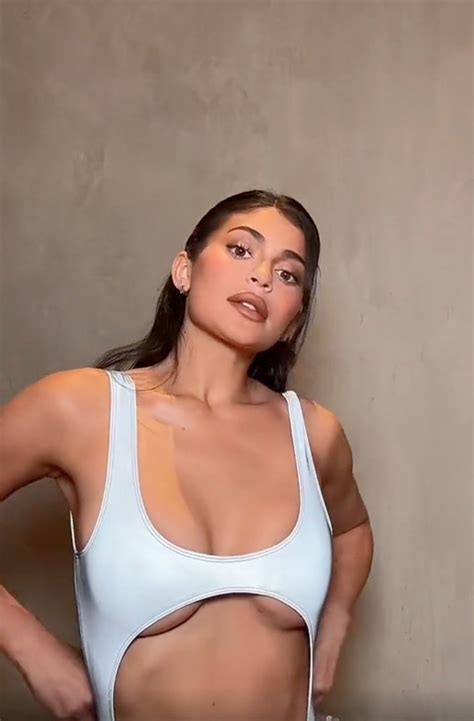 kylie jenner drops jaws as she flashes major underboob in tight bikini while star gets dressed
