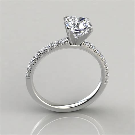 A moissanite engagement ring brings a flair to their finger with flickers of rainbow fire. French Cut Cushion Cut Engagement Ring - Forever Moissanite