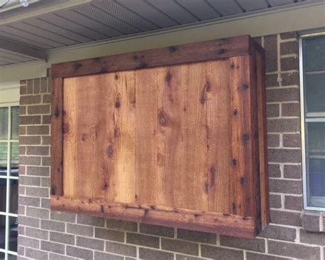 These diy tv wall cabinet plans are cheap and easy to build. Outdoor TV cabinet made of rough cedar lumber | Outdoor tv ...
