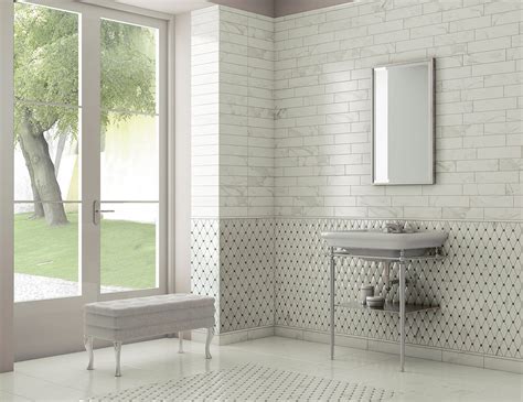 The rich gray and gold dramatic veining and streaks thread effortlessly through the white creamy tone background, encapsulating the true splendor of this elegant natural product. Vallelunga Calacatta Porcelain tile