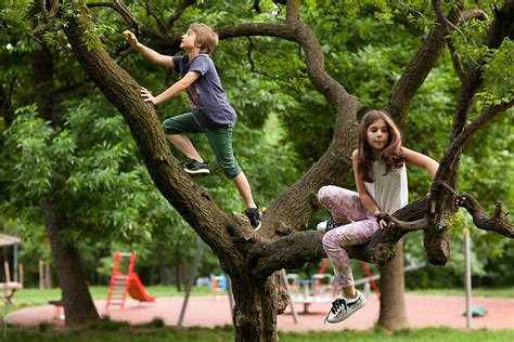 Children Playing In The Park By Stocksy Contributor Mosuno Stocksy
