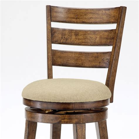 Its solid, yet minimal, silhouette and combination of substantial, natural materials recalls the hallmarks of scandinavian design. Lenox 30" Wooden Swivel Bar Stool in Chestnut | DCG Stores