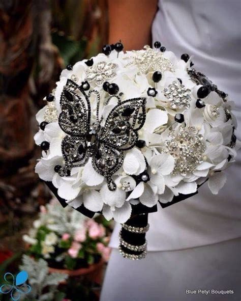Why do brides hold wedding bouquets. Brooch bouquet?! Why not! I wonder how heavy is this for a ...