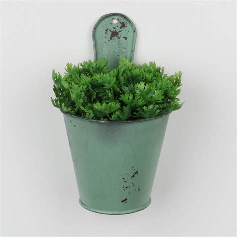 Some of the technologies we use are necessary for critical functions like security and site integrity, account authentication, security and privacy preferences, internal site usage and maintenance data, and to make the site work correctly for browsing and transactions. sea foam green set of three wall flower pots by dibor ...