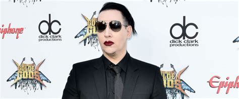 Marilyn manson, real name brian warner, is reportedly set to turn himself into police after being wanted for an active arrest warrant over two counts of 'simple assault'. Marilyn Manson Mourns His Mother's Death - ABC News