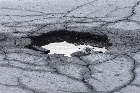 Large Potholes Uk Roads The Car Expert