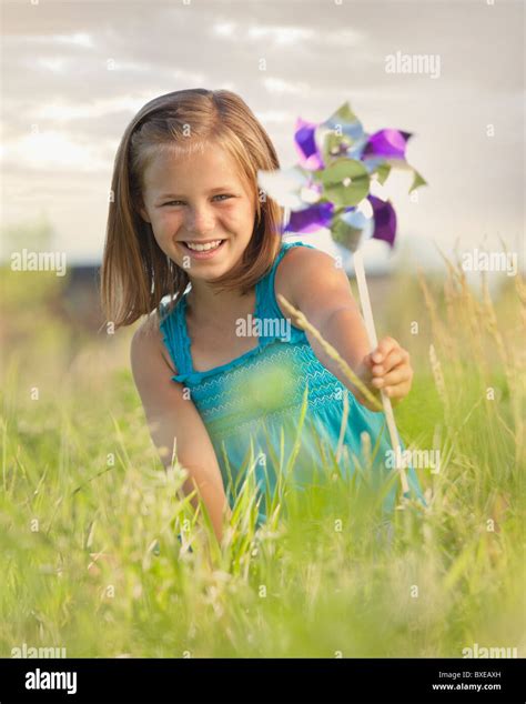 Girl With A Pinwheel Hi Res Stock Photography And Images Alamy