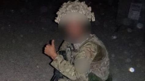 Pictures Appear To Show Raf Man Posing With Dead Taliban Fighter Bbc News