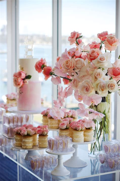Pastel pink and peach themed Bridal Shower dessert table. Styled by