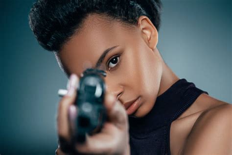 8300 Beautiful Women With Guns Pic Stock Photos Pictures And Royalty