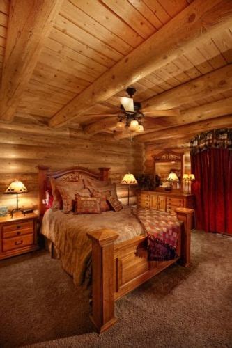 Two bedrooms, open concept, fireplace and great views. Cozy bedroom in log cabin | Log home bedroom, Log home ...