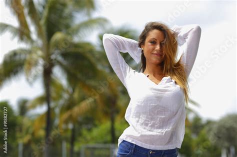 Woman Posing With Arms Above Her Head Buy This Stock Photo And