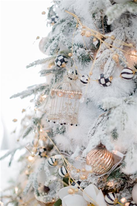 Find a unique ombre white to black christmas tree and decorate it with contrasting or matching ornaments for a statement. Home for Christmas - Black and White Christmas Tree