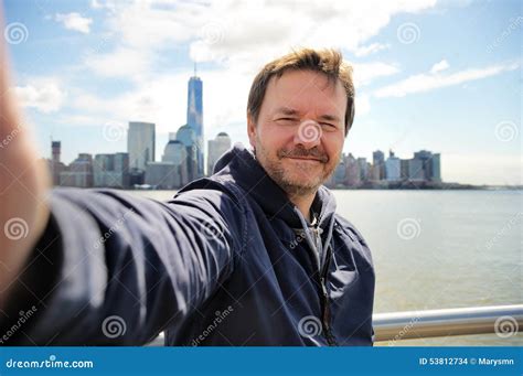 Happy Tourist Taking A Self Portrait In New York City Stock Photo