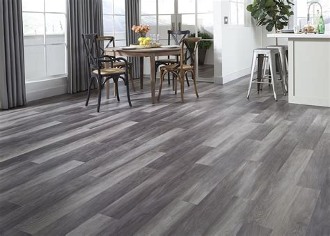While there are bargains on the cheap end and overpriced flooring at the high end, you mostly get what you pay for. Stormy Gray Oak - a waterproof luxury vinyl plank! | Silver & Gold Collection | Home for the ...