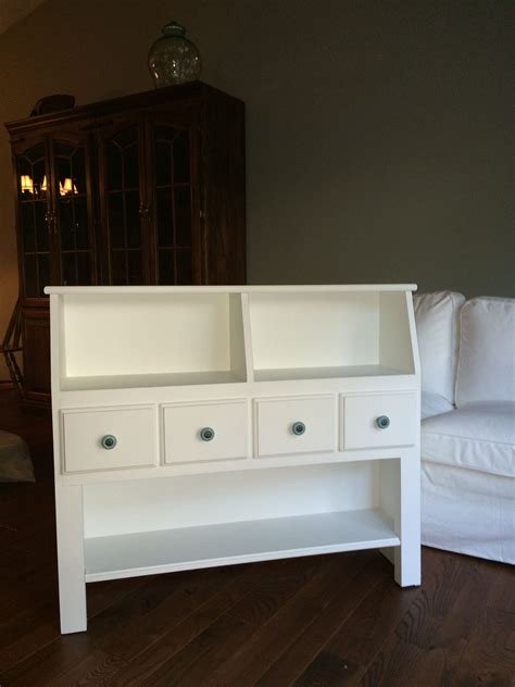 A bedside bookcase headboard is a perfect place for book lovers to place and keep their books safe. Repurposed twin bookcase headboard | Bookcase headboard ...