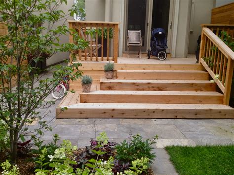 Cedar treads and risers give steps a slightly more refined look. After - expanded cedar deck, steps and flagstone walkway ...