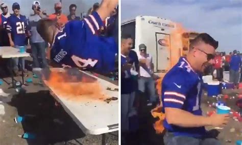 Video Bills Fan Sets Himself On Fire After Jumping On Flaming Table