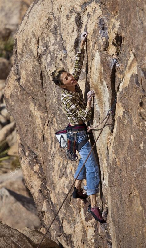 Female Climber Clinging To A Cliff Stock Photo By ©gregepperson 5940025