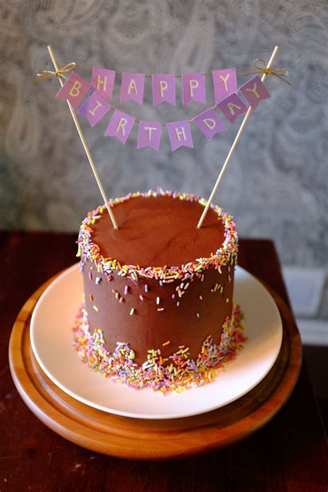 Spread with a layer of mascarpone filling. Chocolate sprinkle cake | Sprinkles birthday cake, Cake ...