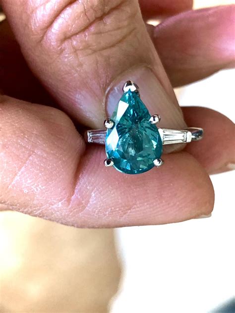 Just like diamond shape, size, and color and just like the type of metal, ring band width follows trends, varying from wide and bold to thin. Teal Natural Sapphire Diamond Engagement Ring Gold For ...