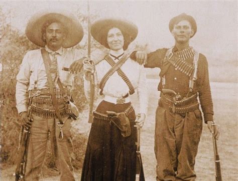 An Old Photo Of Three People In Mexican Gauchos