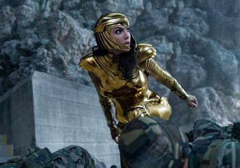 See Gal Gadot In Wonder Womans Stunning Gold Armor Our Best Look Yet
