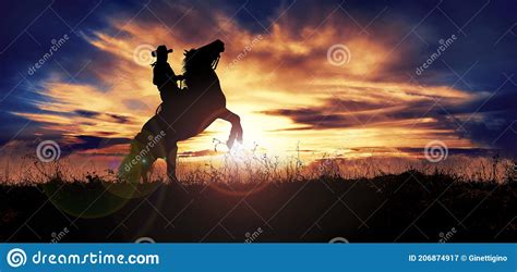 Silhouette Of Cowboy Rearing His Horse At Sunset Stock Image Image Of