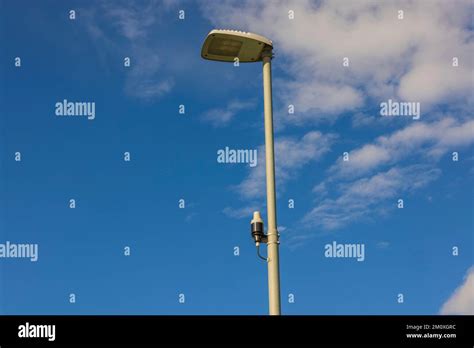 Technology View Of Light Sensor On Street Lighting Pole On Blue Sky