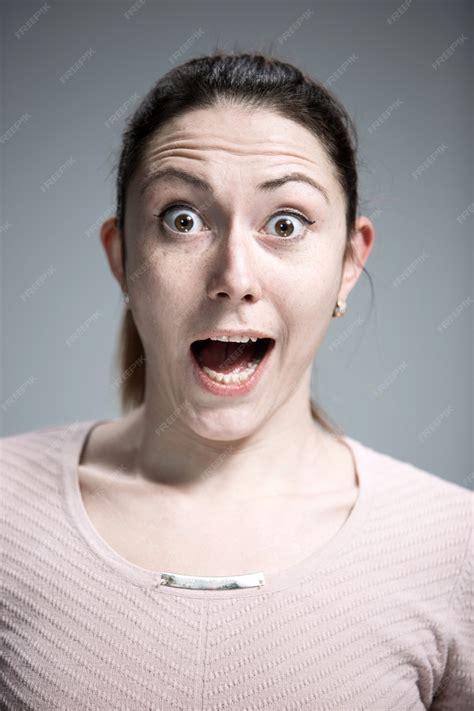 Free Photo Portrait Of Young Woman With Shocked Facial Expression