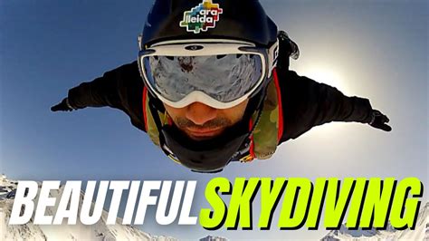Beautiful Skydiving Above Snowy Mountains The Perfect Landscape For