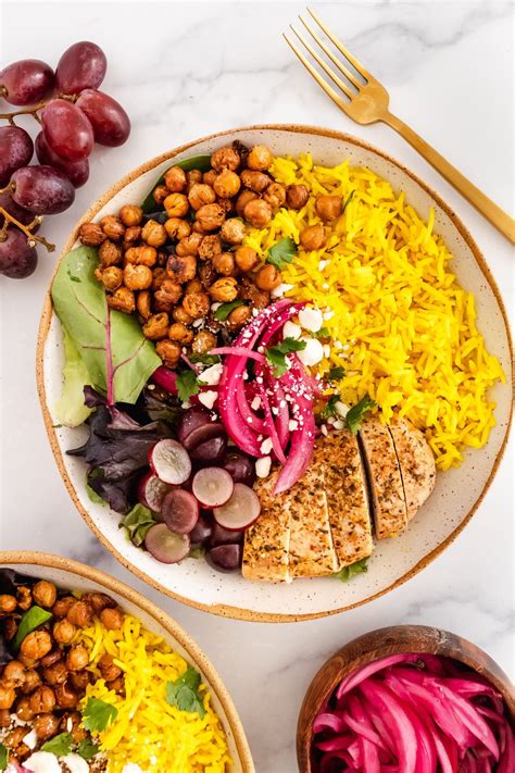When the golden coconut broth is bubbling, carefully lower in the chicken breasts. Turmeric Coconut Basmati Rice Bowl | Once Upon a Pumpkin