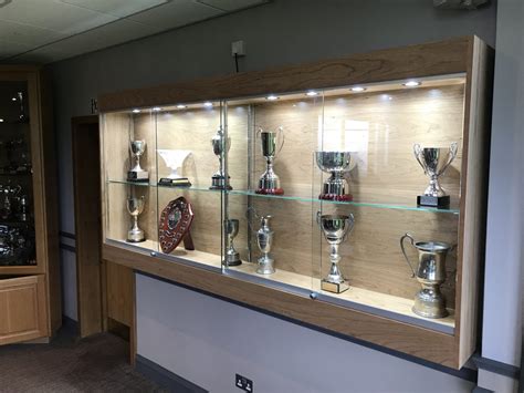 Most av cabinet feature lockable wheels, lockable front doors and some have rear door access, rack mounting options and sliding wooden shelves. Wall Mounted Trophy Cabinet - Heron Cabinets Ltd