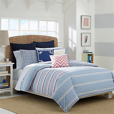Done in white and light shades of gray and blue, these bedrooms provide a sophisticated yet entirely approachable haven. Nautica® Destin Reversible Comforter Set in Light Blue ...