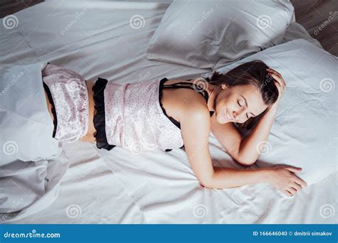 Girl In Pink Pajamas Lying On Bed Stock Photo Image Of Chilling