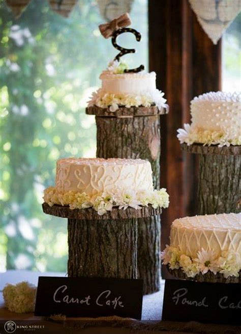 rustic chic wedding cake with tree stump display stand rustic