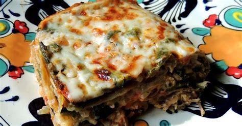 All of azteca's specialty enchiladas include two (2) enchiladas and are served with mexican or white rice, black beans, refried or rancho (whole) beans. PASTEL AZTECA | Mexican food recipes, Food, Mexican dishes