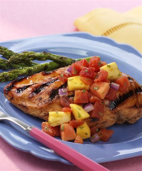 Place the chicken in a large, resealable plastic bag and pour in the marinade. Grilled Marinated Chicken with Tomato-Fruit Salsa | Recipe ...