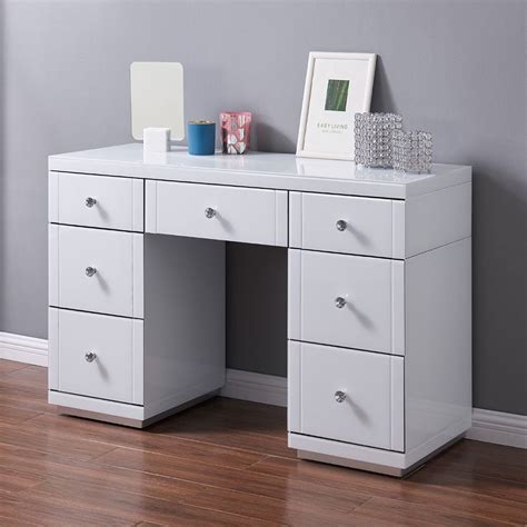 Next to the drawer there's a hinged lid that hides both mirror and practical compartments. Hollywood 7 Drawer Dressing Table White - Rite Price