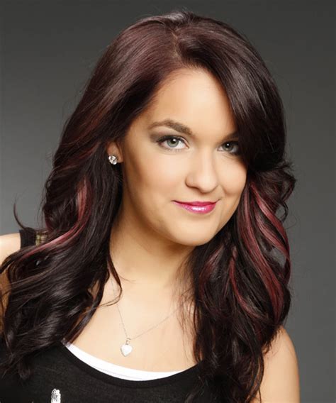 It's a gorgeous, vibrant color—kind of decadent, in a way. Long Wavy Dark Plum Red Hairstyle with Pink Highlights