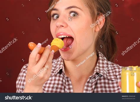 Girl Eating Wiener Sausage With Mustard Stock Photo 29968348 Shutterstock