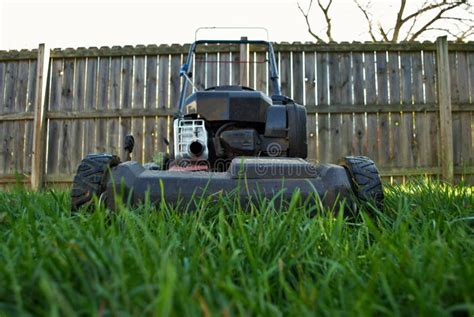 Ground Level View Of A Lawnmower In Tall Grass Stock Image Image Of