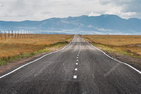 Straight Road Goes To Horizon — Stock Photo © 106363760