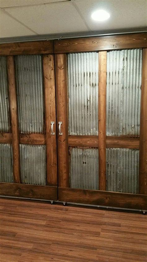 You can even complete them with a simple curtain. My custom-built sliding barn doors!! Rustic Industrial ...